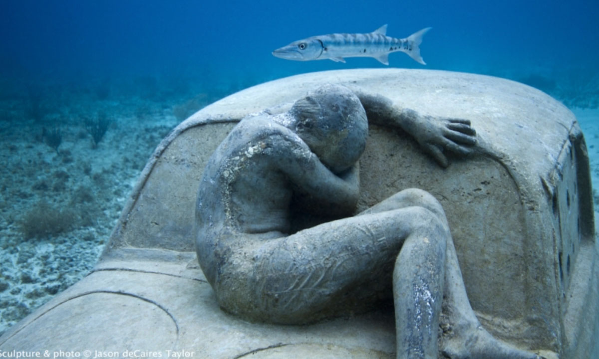 estatuas en MUSA Cancún